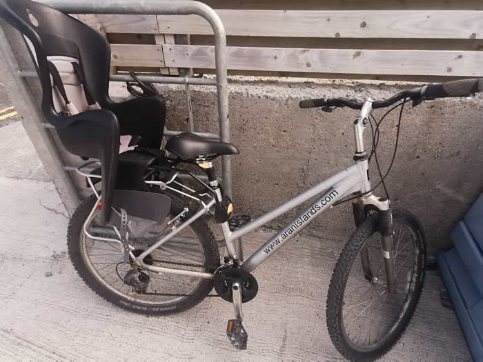 download – 2025-04-16T014508.396 a bicycle is parked next to a chair