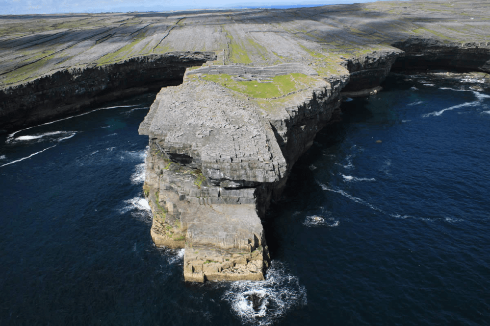 a stone bridge over a body of water