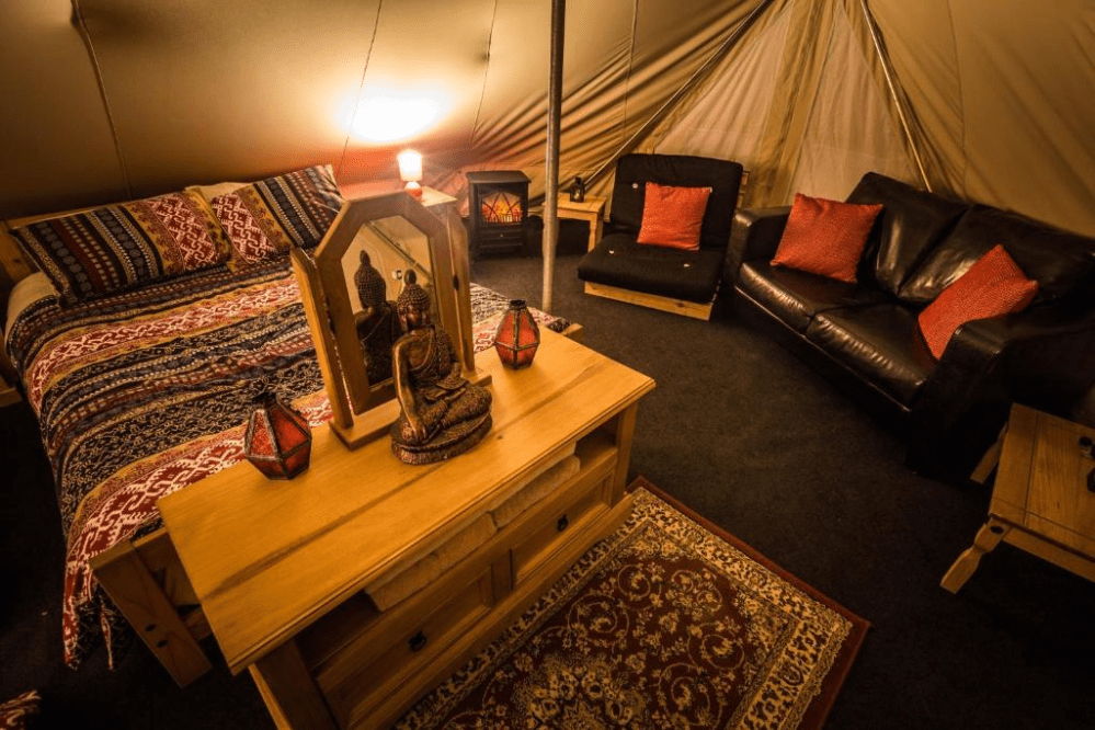 a living room filled with furniture and a rug